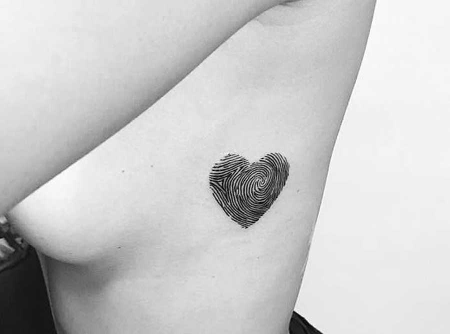 Impronta digitale a forma di cuore Tattoo