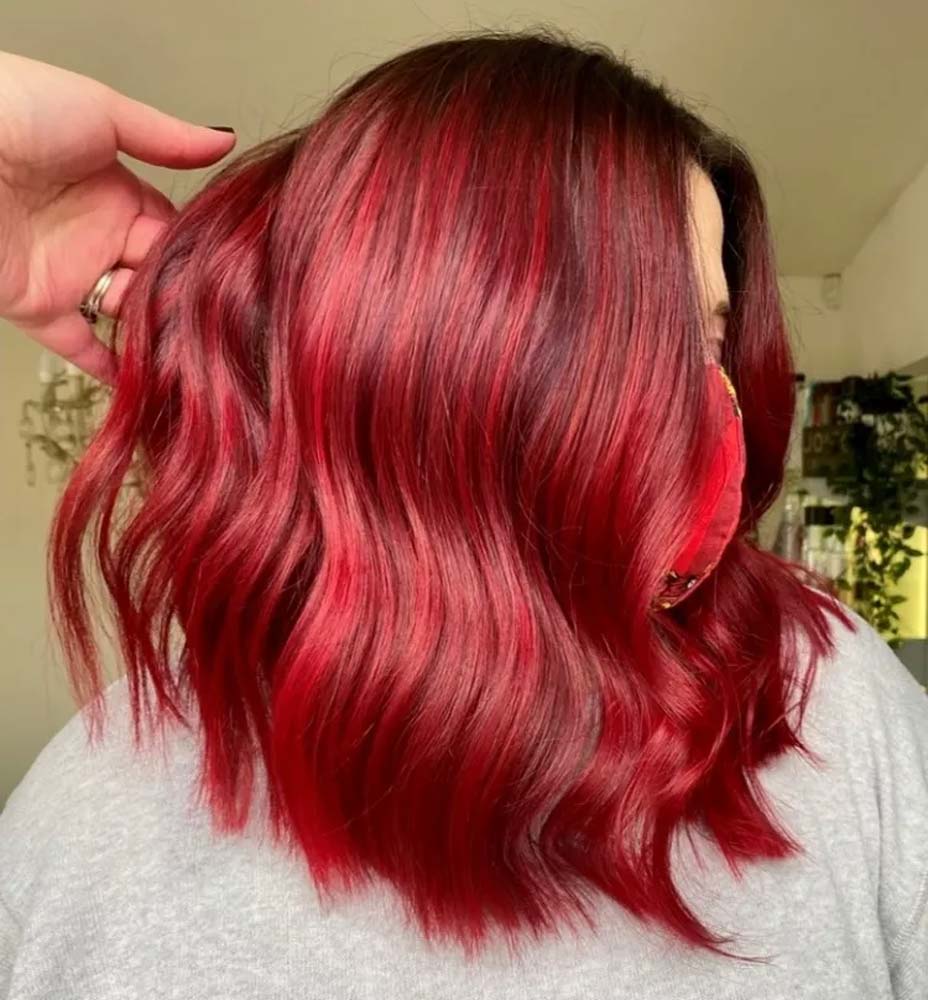 Balayage rosso caramella natalizia americana