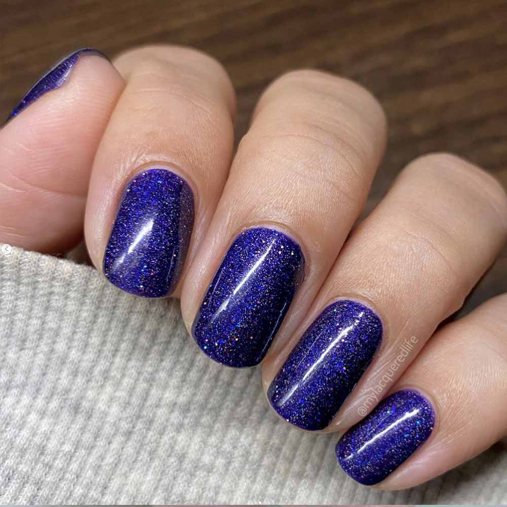 Unghie blu e viola glitter