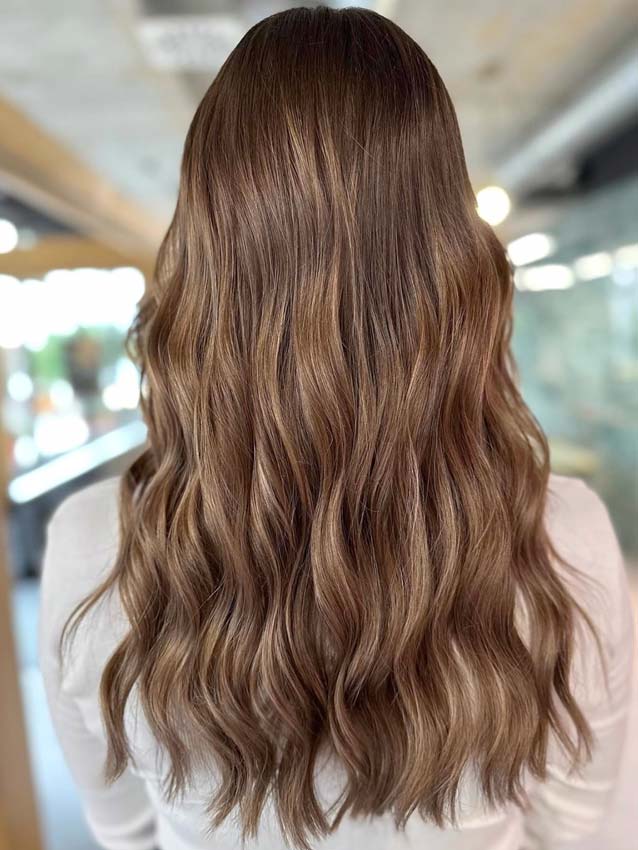 Balayage caramello per capelli lunghi e ondulati