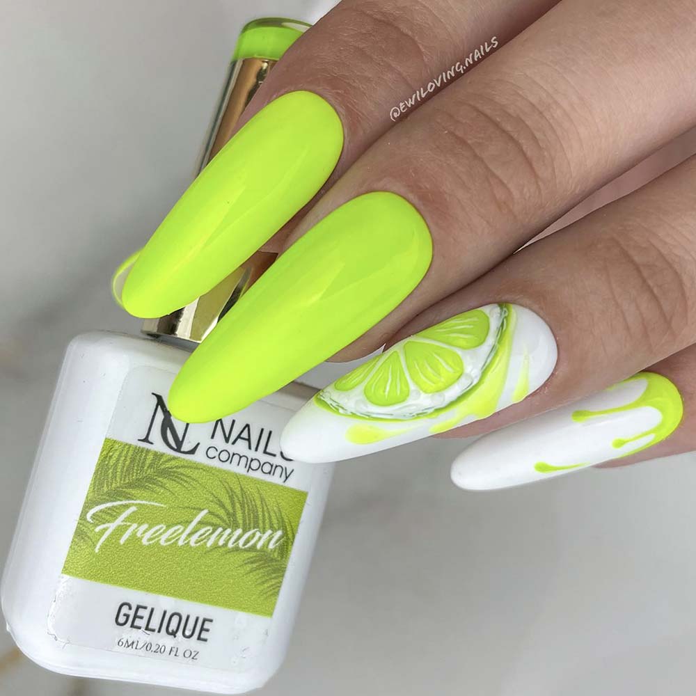 Unghie verde fluo su base bianca a lime disegnato